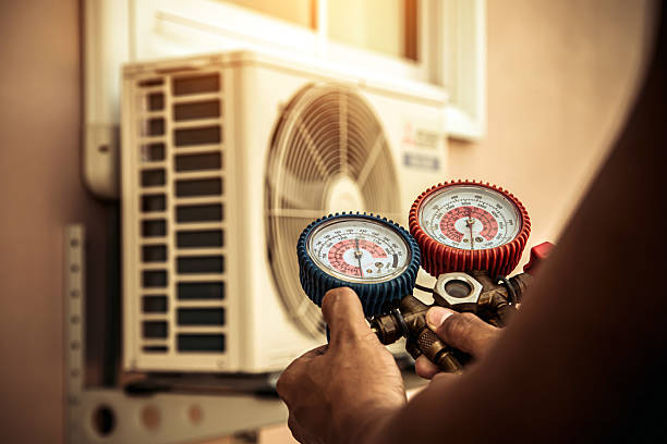 Professional Air Conditioning Service technician working in Somerville, OH